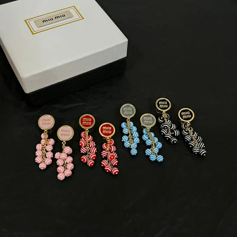 miu miu boucles doreilles pour femme s_12240533